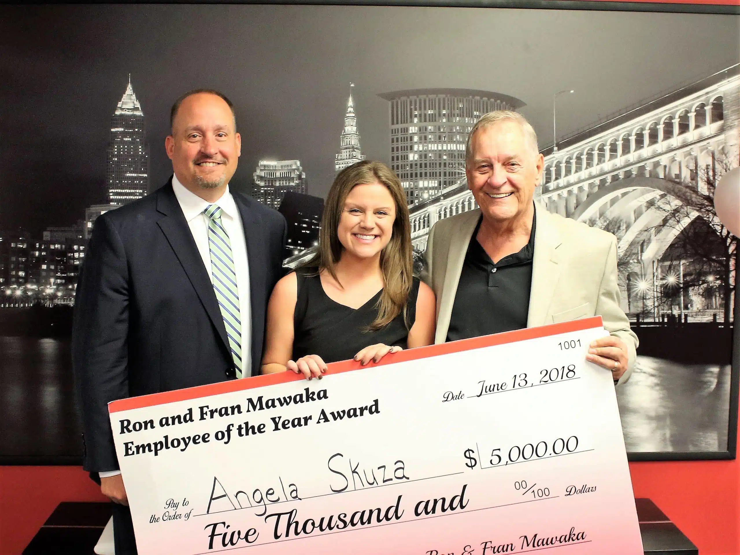 Angel Skuza Awarded $5,000 Check as Employee of the Year 2014