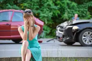 Tired woman driver involved in a fleet accident. 