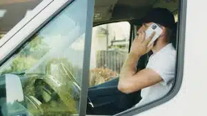 fleet driver talking communicating with fleet operation on the phone