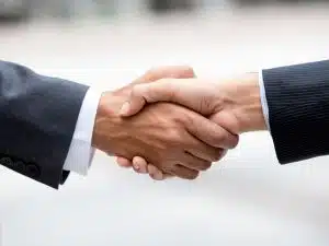 business partners making handshake